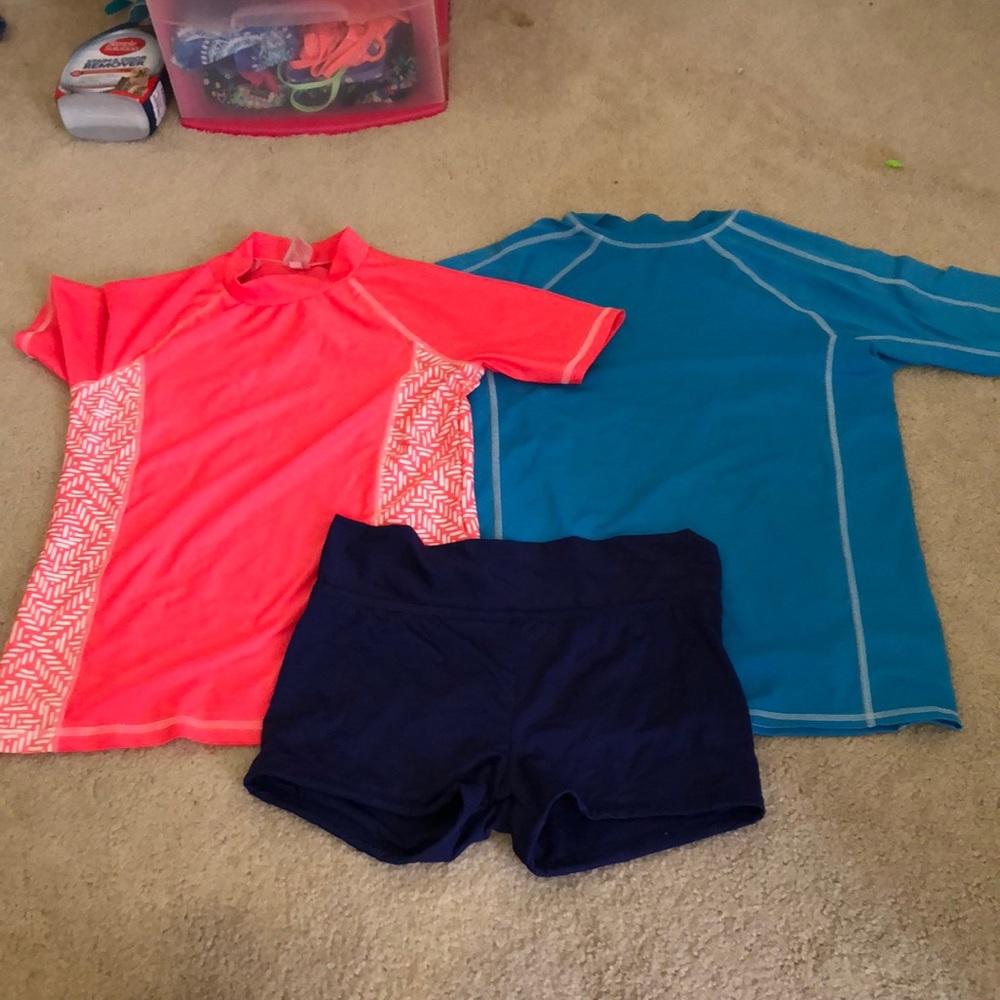 2 girls rash guards and swim shorts